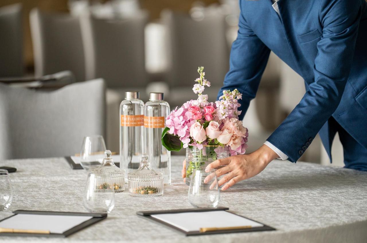 The Fullerton Ocean Park Hotel Hong Kong Exterior photo A hotel staff sets up a meeting room