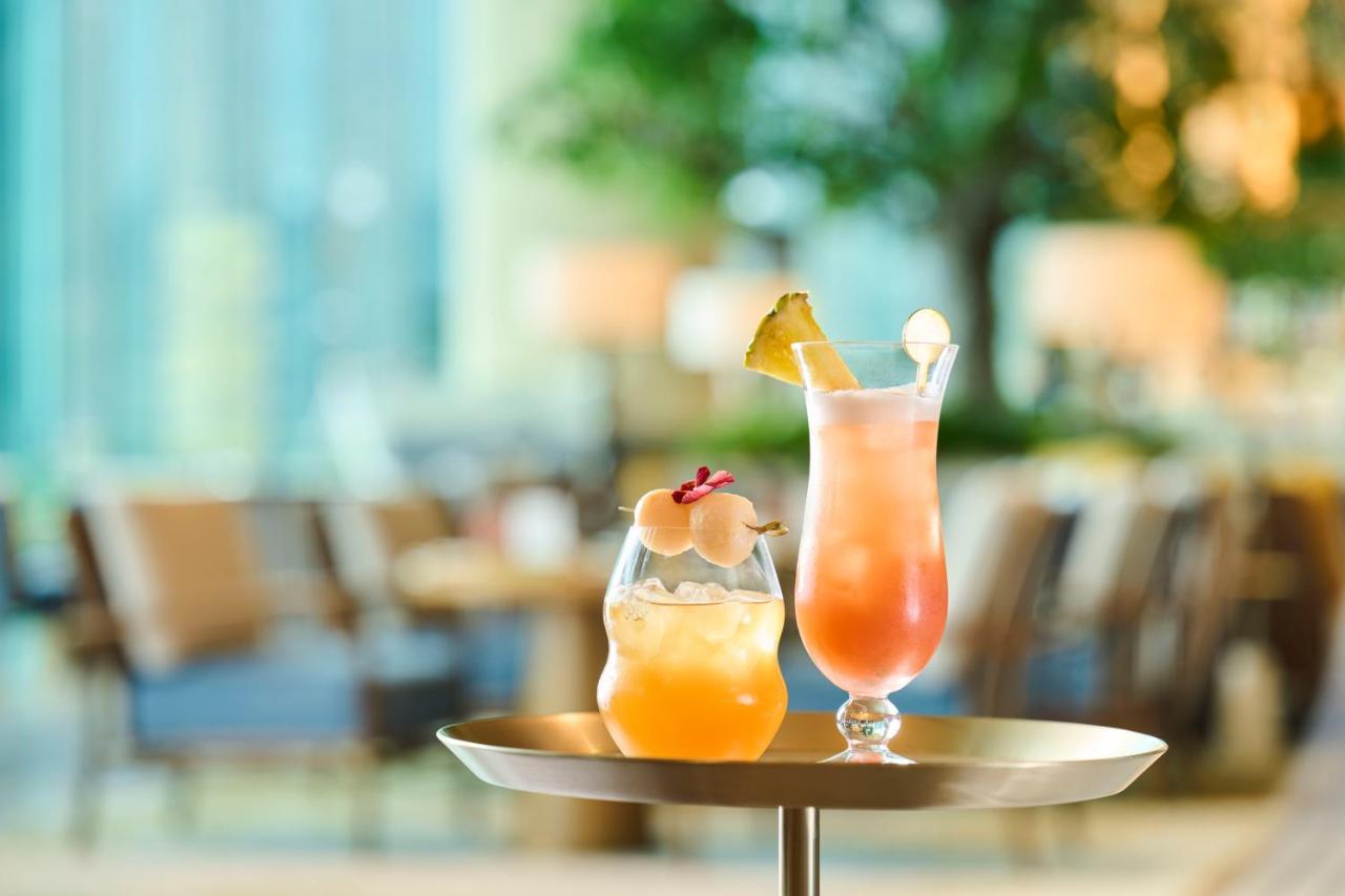 The Fullerton Ocean Park Hotel Hong Kong Exterior photo Two cocktails